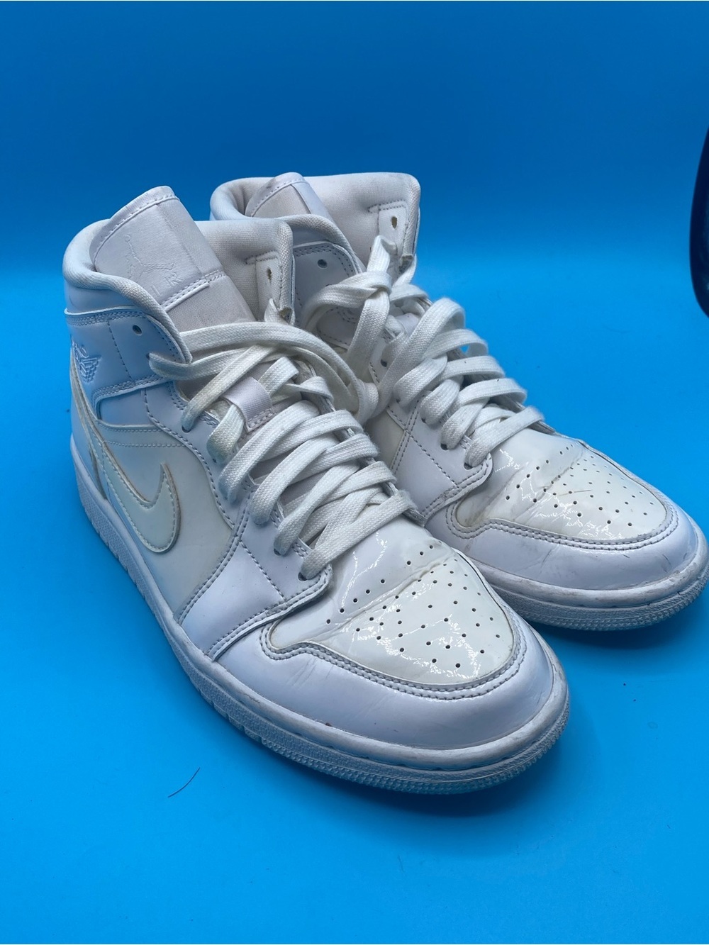 Nike White High-Top Sneakers​